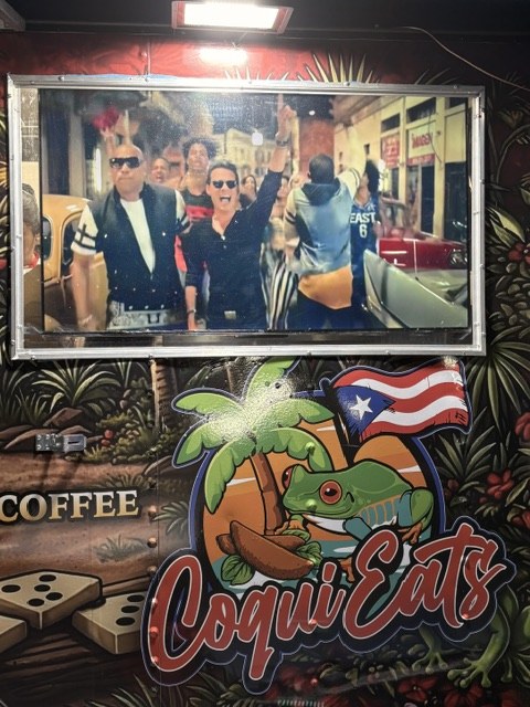 Painted CoquiEats logo with Puerto Rican flag artwork on the truck