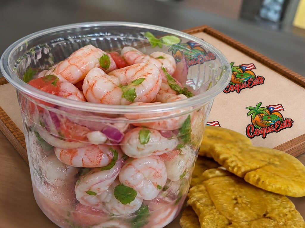 Ceviche de Camarones — Shrimp salad. Choice of: Tostones, French Fries, or Arroz con Gandules (Rice w/ Pigeon Peas).